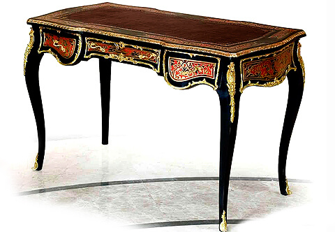 A delicate French Louis XIV André Charles Boulle style ormolu-mounted tortoiseshell and engraved brass marquetry and ebony finish Lady’s desk, The three drawers desk is raised by four elegant cabriole legs decorated by richly top chased ormolu acanthus volute chutes and terminated with handsome volute acanthus ormolu sabots, The elegant inset gilt-tooled leather top surrounded with intricate tortoiseshell and brass marquetry inlay and bordered with a finely hammered foliate ormolu band above the three drawers, The three drawers, the sides and the back are inlaid with tortoiseshell and brass marquetry, bordered with highly detailed foliate ormolu filets in a satin and burnish finish, Each drawer has foliate ormolu handles with ormolu keyhole escutcheon to the central recessed drawer, The bureau de dame is offered with a matching boulle style office chair per request